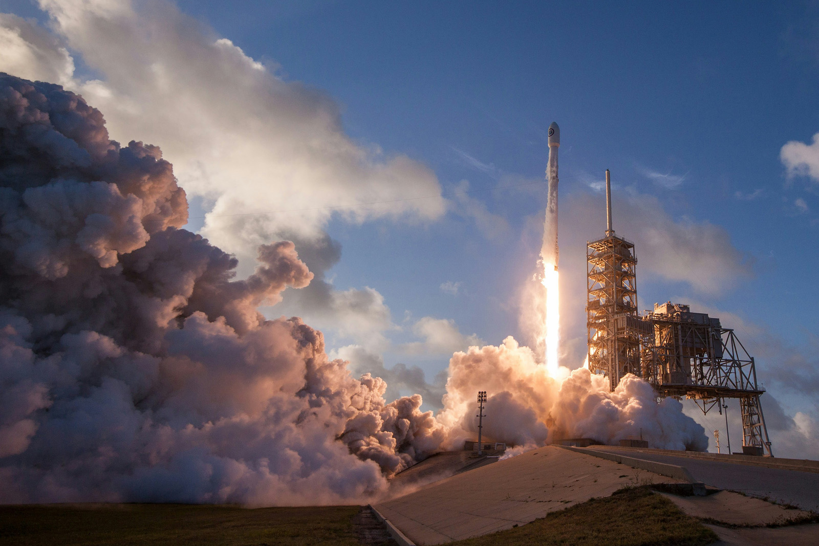 Rocket lifting off at golden hour